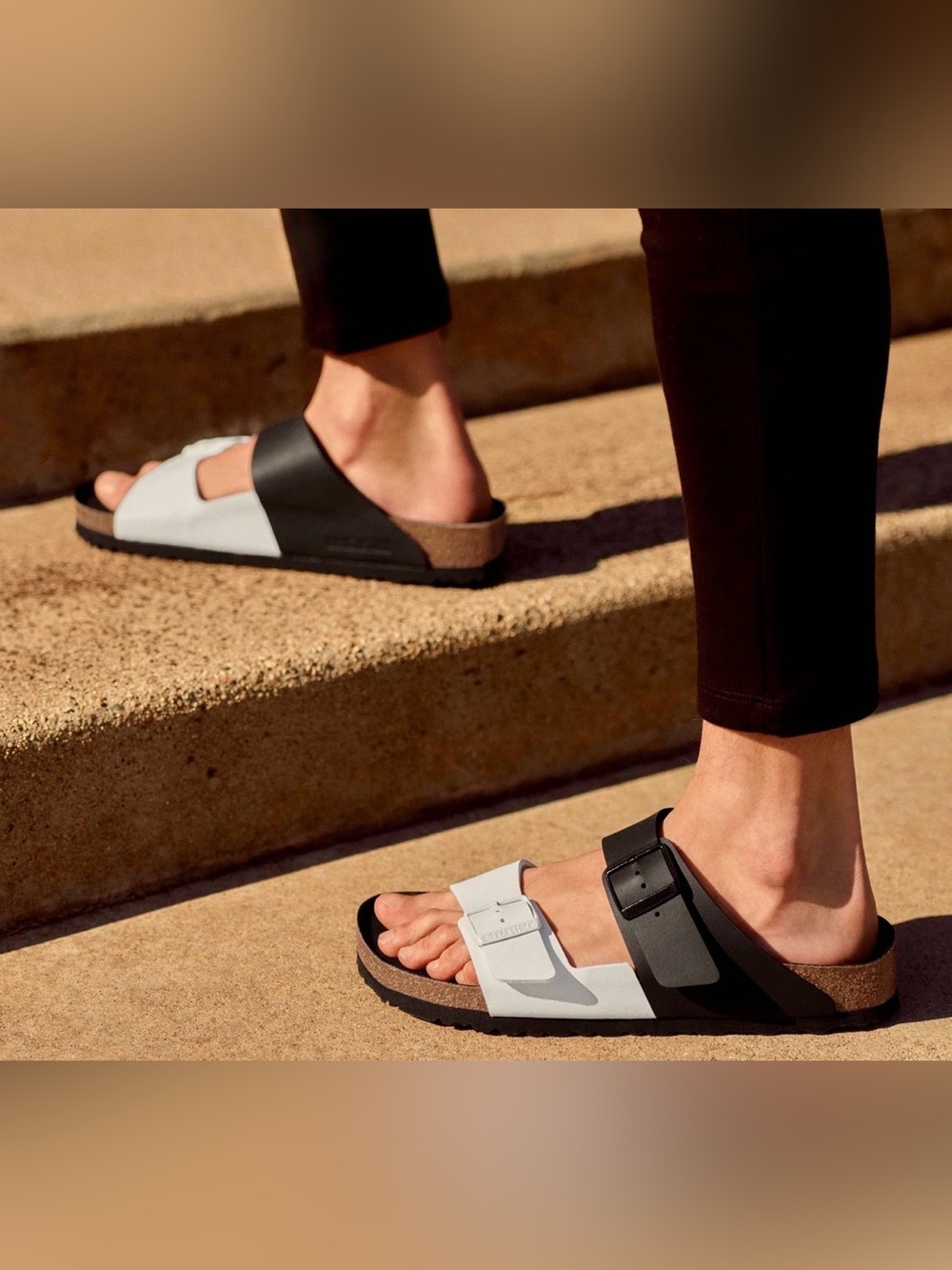 Birkenstock Two-Band Slide Sandals in Black and White size 6.5-7